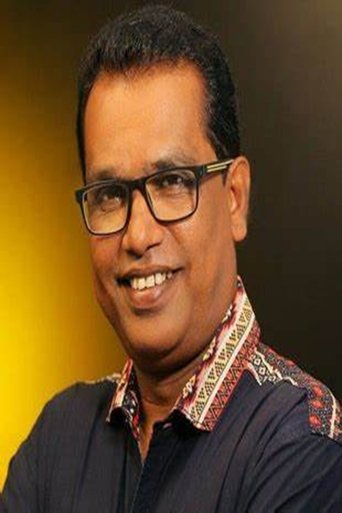 Portrait of Mani Shoranur