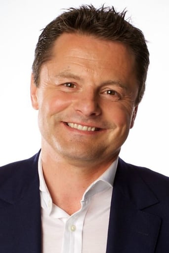 Portrait of Chris Hollins