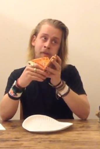 Poster of Macaulay Culkin Eating a Slice of Pizza