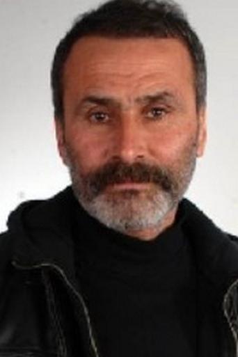 Portrait of Suat Oktan