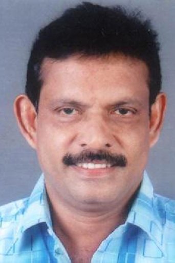 Portrait of E A Rajendran