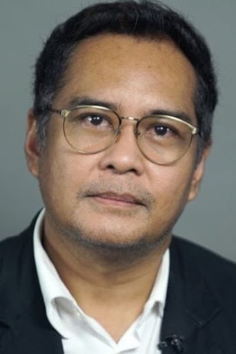 Portrait of John Arcilla