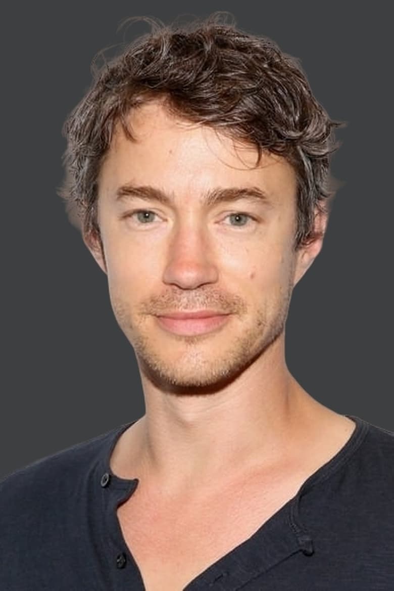 Portrait of Tom Wisdom